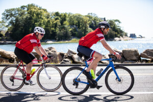 people biking with smiles on their faces
