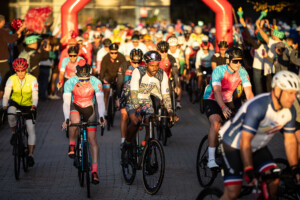 people biking with smiles on their faces