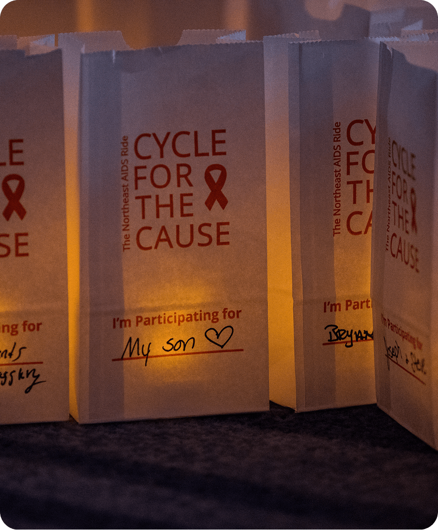 cycle-for-the-cause-2026-home-4 people biking with smiles on their faces